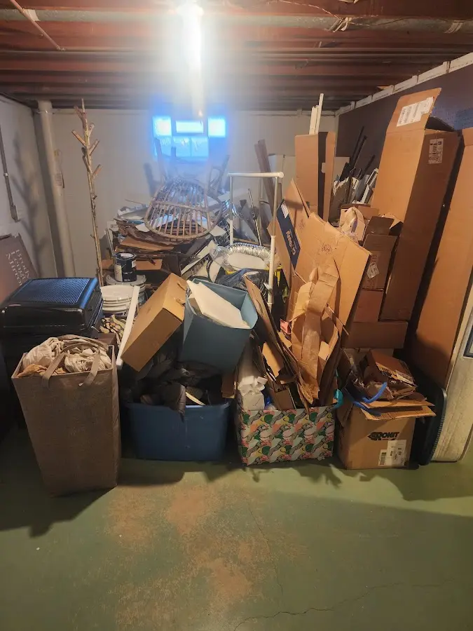 Roll-off dumpster container at job site for Construction Dumpster Rental in Wolcott